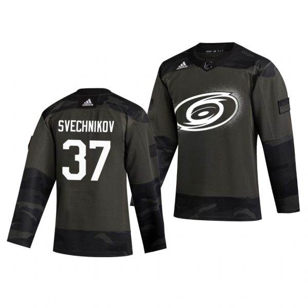 Impressive Carolina Hurricanes #37 Andrei Svechnikov Adidas 2019 Veterans Day Men's Authentic Practice NHL Jersey Camo to complete your fan gear collection